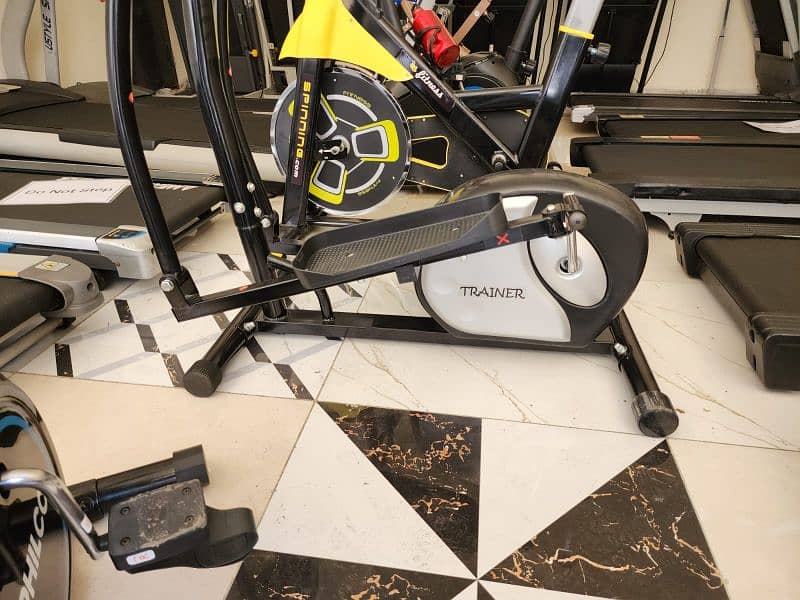 treadmils. (0309 5885468). gym cycles. home gym. ellapticals. spin bike 13