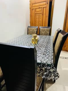 Glass dining table with 6 chairs