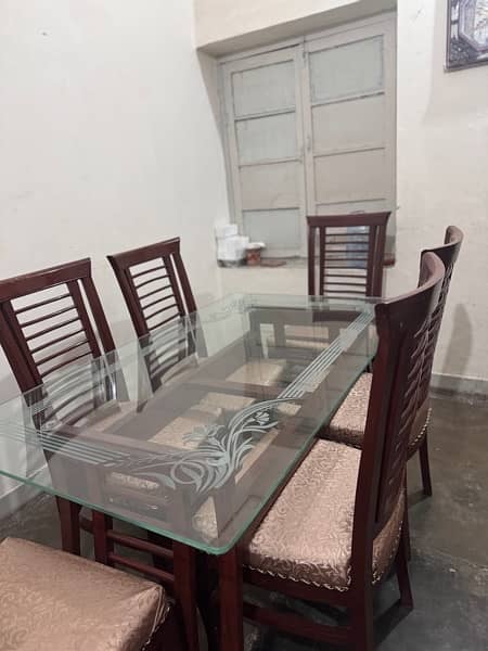 Pure wooden dining table with 12 mm tinted glass 2