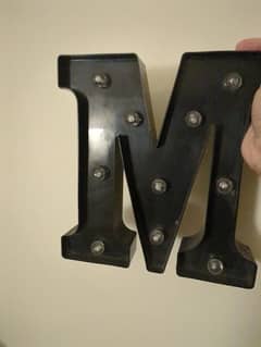 M shaped light