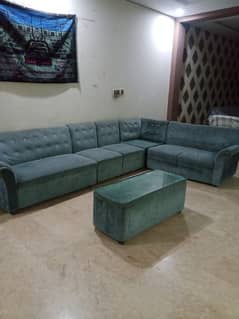 urgent sale  . . L shape  sofa  with  tabel