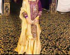 purple long shirt with golden sharara and duppta