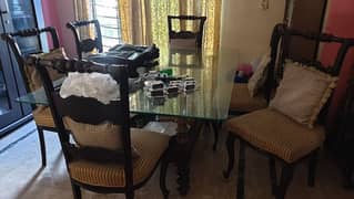 6 Seater Wooden Dining table with Glass Top.