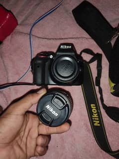 Nikon d3300 with 1855 lens and attach big battery   with bag  complete