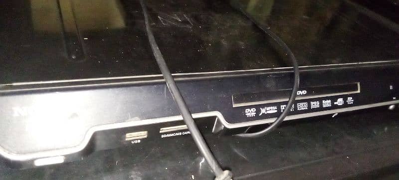 DVD player in good working condition with remote and cable 1