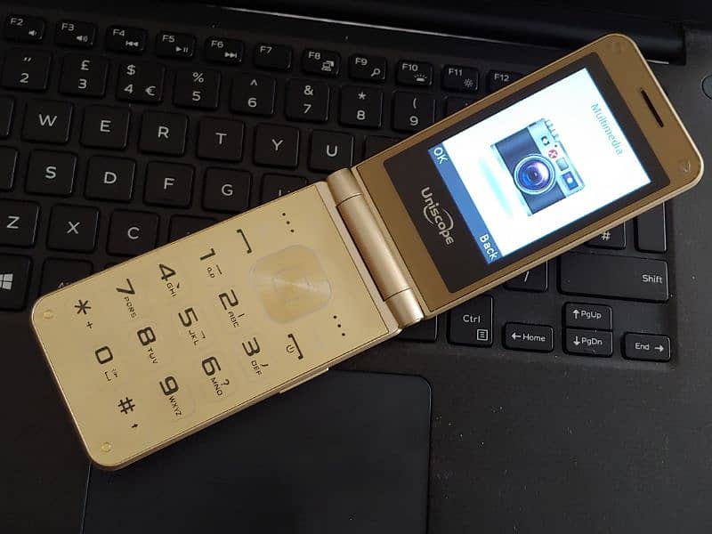 Flip Folding Phone Dual Double Sim Golden Color PTA Approved Original 0