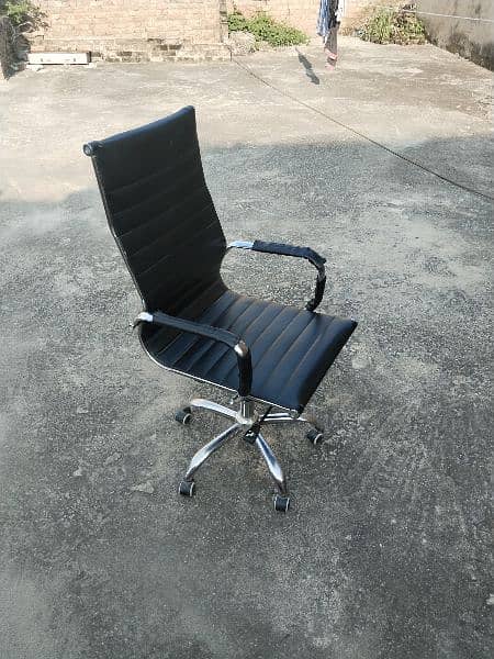 Double lever imported high back chair. 1