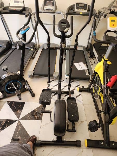 treadmils. (0309 5885468). gym cycles. home gym. ellapticals. spin bike 11