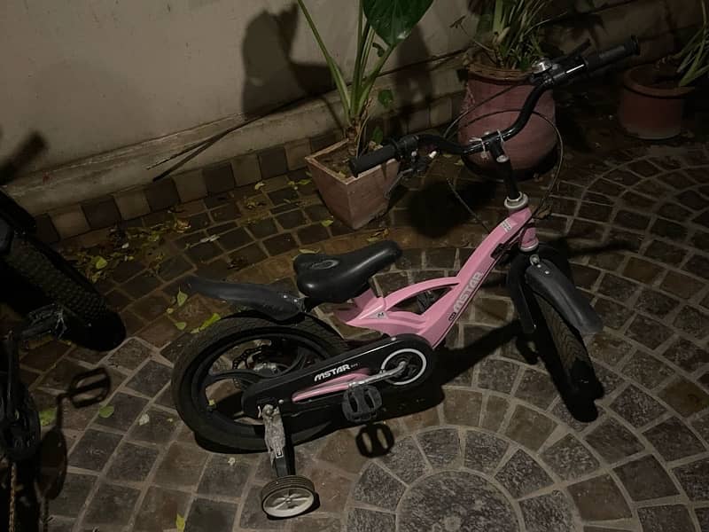 selling pink childrens bicycle in perfect unused condition 6