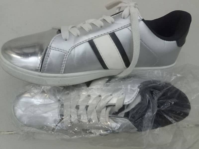 white and silver  colour shoes 1