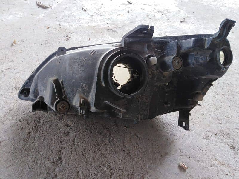 Honda civic 2002 headlight LH 0