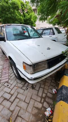 Corolla 1986 in running condition better than mehran khyber charade