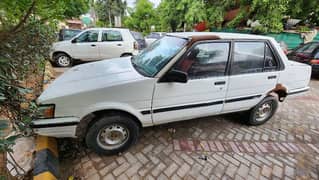 Corolla 1986 in running condition better than mehran khyber charade