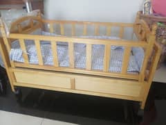 Baby Cot with Swinging top, and one Carry Cot