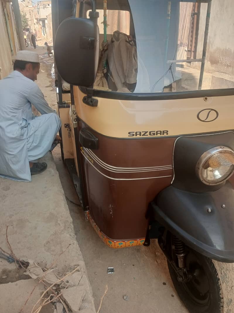 urgent selling my  sazgar rickshaw 2016 model 13