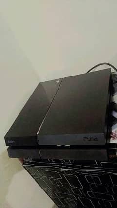 Playstation 4 with 7 gaming CDs