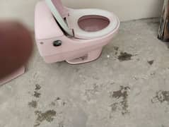 One piece commode, pink colour