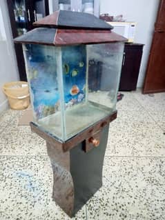 Fish Aquarium with wooden stand.