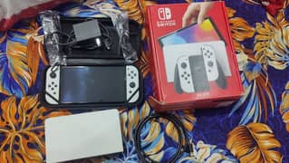 Nintendo Switch OLED with all original accessories and box