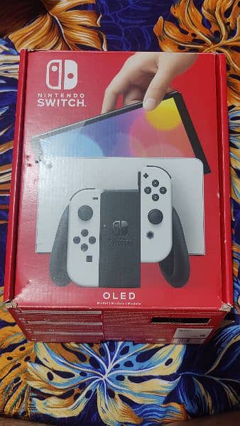 Nintendo Switch OLED with all original accessories and box 1