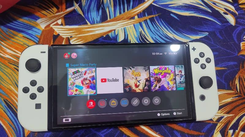 Nintendo Switch OLED with all original accessories and box 2