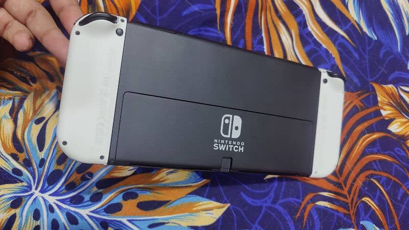 Nintendo Switch OLED with all original accessories and box 4