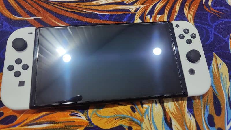 Nintendo Switch OLED with all original accessories and box 5