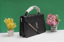 women's leather textured hand bag