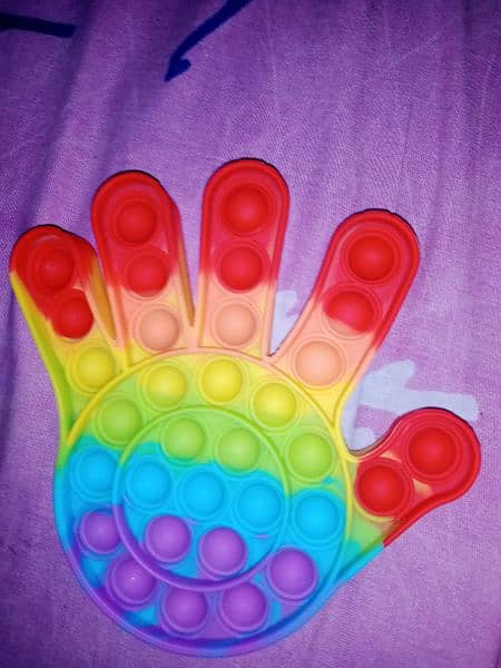 puppet with a rainbow colour hand shape 2