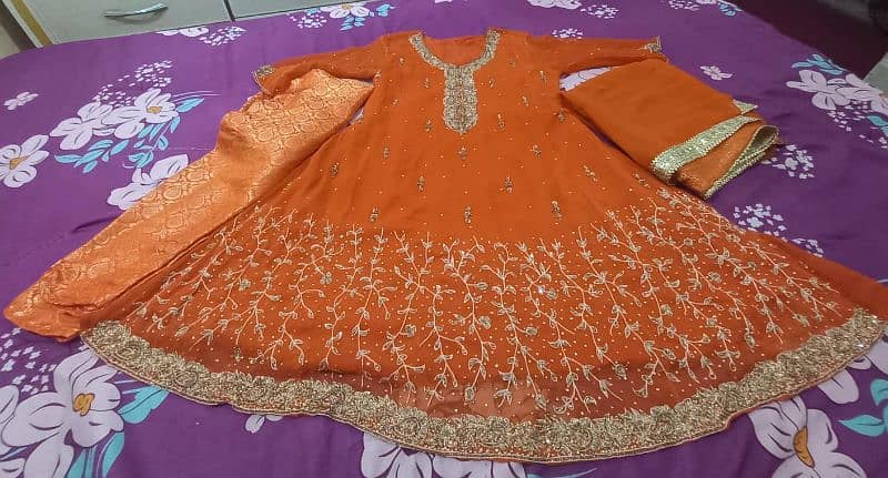 Rust orange wedding wear. 0