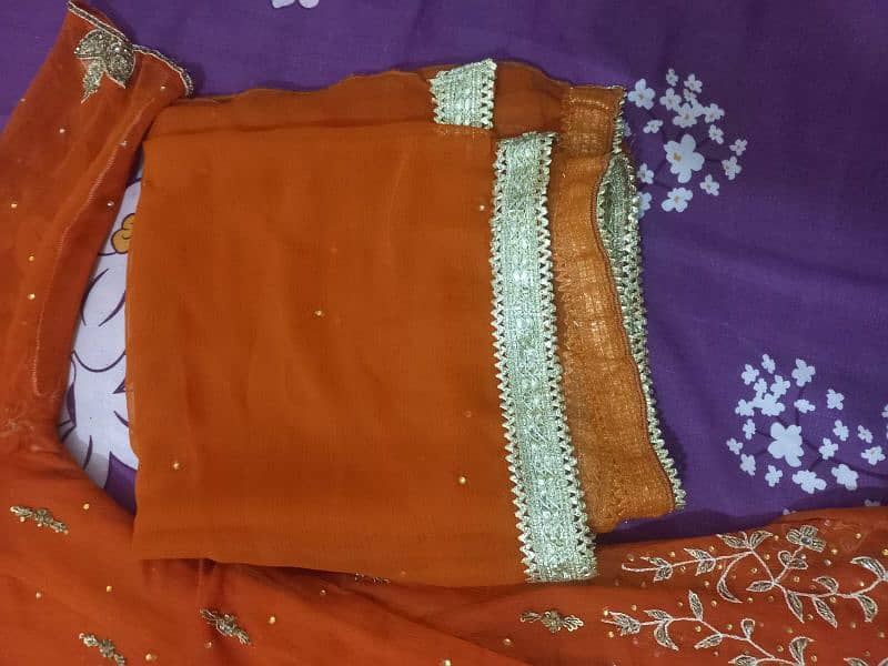 Rust orange wedding wear. 1