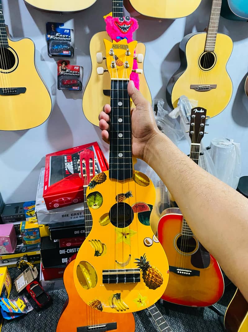 Wow Guitars Violins Cajon Store in Islamabad city Best Guitar shop 19