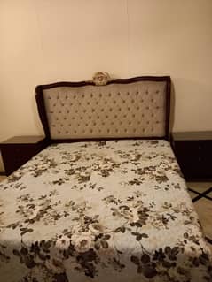 double bed / wooden bed with mattress / side tables / dressing table