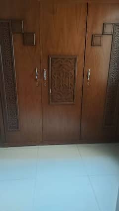 three door cupboard