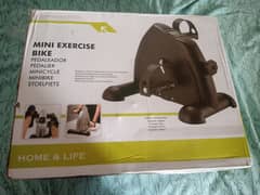 Exercise machine with foot pedals