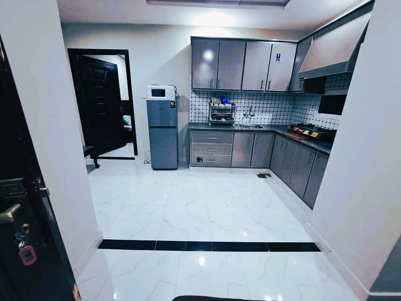 Spacious 2-Bedroom Fully Furnished Apartment Available For Rent! Located On The Main PWD Road This 1000 Sqft Gem Is A Steal At Just 55k Don't Miss Out! 5