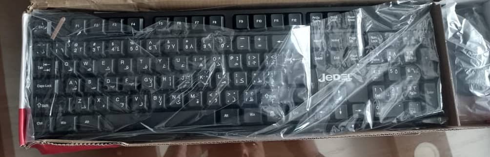 BRAND NEW WIRELESS KEYBORD AND MOU 1