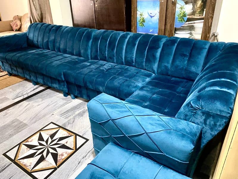 L shaped 7 seater sofa with seeti in bluish zinc color 1