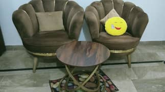 Two Sofa chair with table new condition