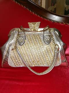 golden sliver shade hand bag