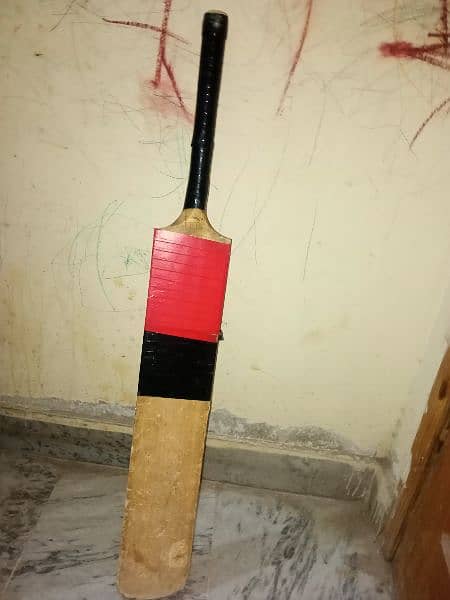 A Tape ball cricket bat 0