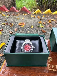 men’s cherry dial Rlx watch