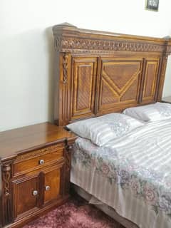 Bed with Side tables and a large Dresser