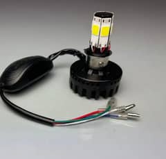 MOTORCYCLE HEADLIGHT WITH FOUR COLOURS AND FLASHER.