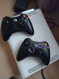 Xbox 360 with two wireless controllers