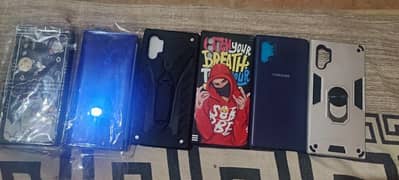 SAMSUNG NOTE 10 PLUS BACK COVERS AND A BOOK COVER