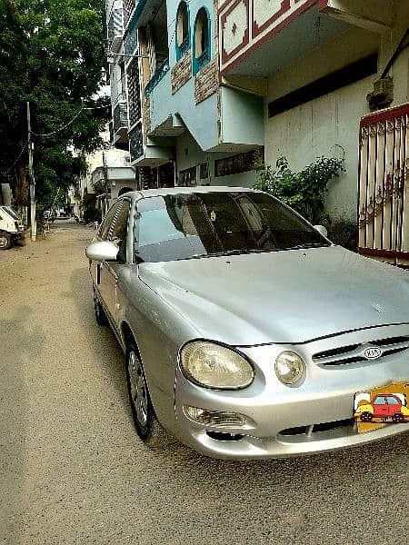 KIA Spectra 2002 Silver colour new tyre leather seats cover. 5