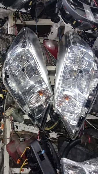 2012 model vitz original headlights 0