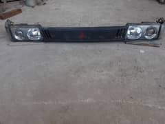 2010 Mitsubishi head lights and jali