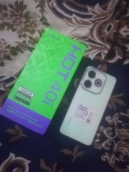 infinix hot 40i 16gp. . 128gp 0